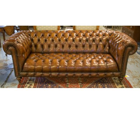 CHESTERFIELD SOFA, by Fleming & Howland, vintage, traditional buttoned tan leather upholstered with rounded back and arms on 