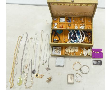 A collection of vintage costume jewellery including silver items, pendants, brooches, earrings, beads, earrings, rings, brace