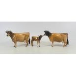 Beswick Guernsey Cattle including Two Cows and a Calf (3)