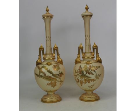 Royal Worcester, Blush Ivory Pair of Lidded Vases with Gold Fern Design. Reg. Des. No. 141376. Shape No. 1406. Both finial ch