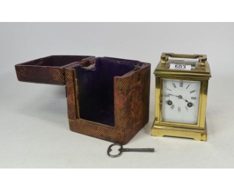 A Gorge Cased Carriage Clock in Leather Case. Glass Window not present. Cracks to enamel dial. Height: 17cm 
