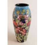 A large Moorcroft pottery vase decorated in the Scarlet Cloud pattern by Rachel Bishop. Dated