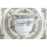 A collection of Minton Persian Rose tea and dinnerware, including tea set, large platters,