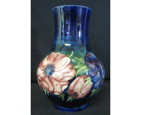 LARGE MID 20TH CENTURY MOORCROFT ART POTTERY TUBE LINED ANEMONE VASE of baluster form with flared neck, pressed and painted m