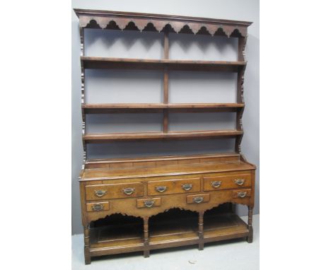 LATE 18TH CENTURY WELSH SWANSEA VALLEY OAK DRESSER having open three shelf rack back with moulded cornice above arcade frieze