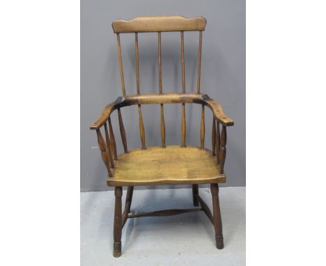 19TH CENTURY STICK BACK TRADITIONAL ELBOW CHAIR in mixed woods, probably originally stained, having open arms, moulded seat o