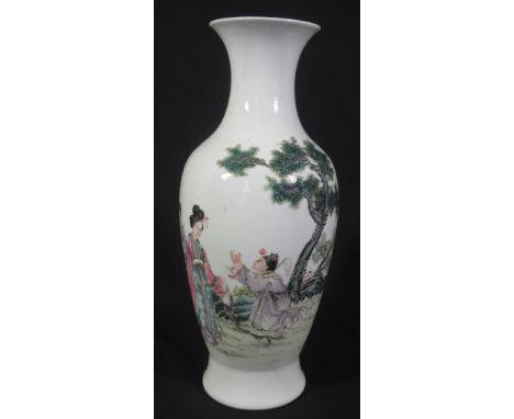 CHINESE PORCELAIN BALUSTER VASE finely decorated in Fencai enamels, depicting two ladies standing beneath a pine tree in a ga