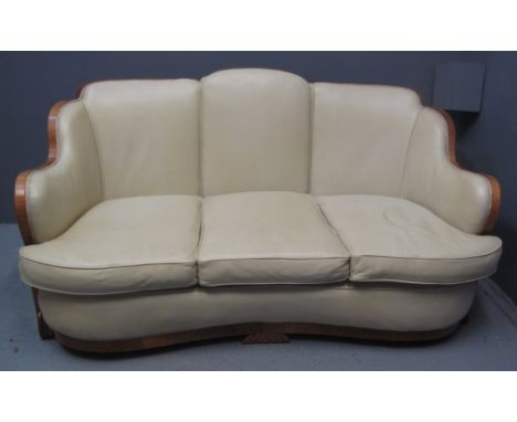 1930'S ART DECO CLOUD BACK LEATHER THREE PIECE SUITE in walnut veneered frame, comprising three seater sofa and two armchairs