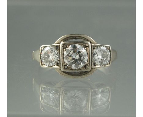 THREE STONE DIAMOND RING set in white metal. Estimated total diamond weight 1ct. Ring size K 1/2. Weight 2.5g approx. (B.P. 2