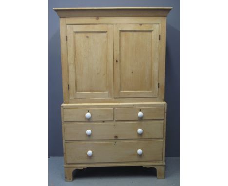 19TH CENTURY PINE TWO STAGE PRESS CUPBOARD having moulded cornice above two blind panelled doors, the interior revealing two 