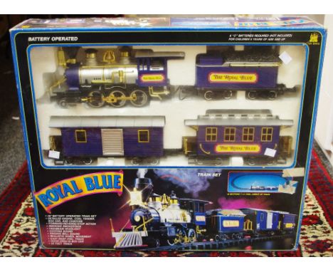 A Toy State Royal Blue Train Set no. 6086 comprising engine, tender, box car, caboose, 20ft of track, original box