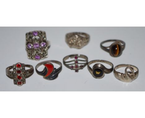 An Art Deco silver and marcasite ring; another, enamel; other silver rings, including a novelty example as an owl (8)