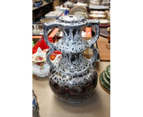 A brown and cream German Lamp base