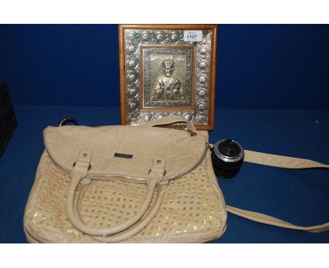 A Chinon Zoom Lens F28-50 m, gold and light tan Charlotte Reid of London handbag and a Greek white metal Icon in wooden frame