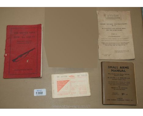 A small A.M.S. manual, a Home Guard Instruction Part 3 Patrolling, a book the Service Rifle and how to use it and a fuel rati