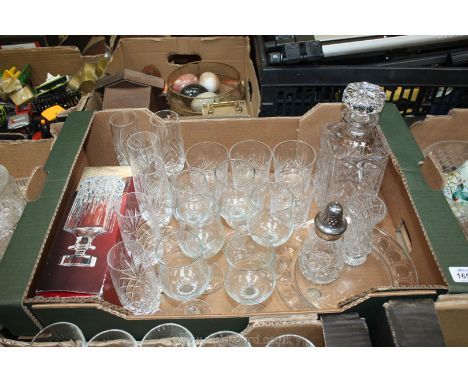 A quantity of glass including decanter with stopper and six matching whisky glasses, six champagne flutes, six tulip-shaped t