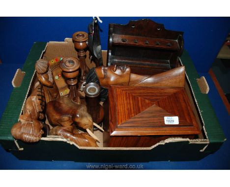 A box of Treen including candlesticks, silhouette plaques, figures, elephants, jewellery box, pipe holder cabinet, etc