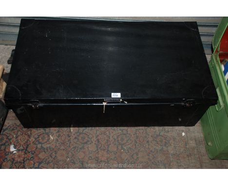 A black metal Cabin Trunk.