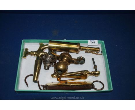 A quantity of miscellanea including oil lamp, brass beer tap, jeweller's blow torch, Salters scales, ceiling fitment, knocker