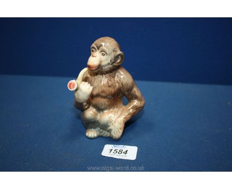 A Beswick rare chimp smoking a pipe