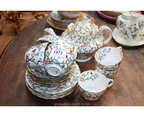 A Copeland Spode 'Shanghai' china part Tea set including seven cups, six saucers, four tea plates and teapot (some cracks)