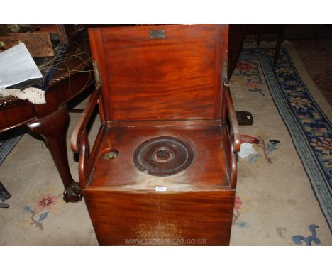 A 19th c. Mahogany Commode with well designed folding action, including the arms. 23 1/4" wide, 17 3/4" deep, 18 3/4" high, (
