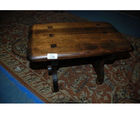 An oval light Oak Occasional Table on turned pillar with four splay feet, 36 1/4" x 21 1/2" x 20 1/2" high.