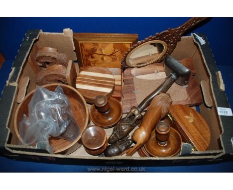 A box of Treen items including candle holders, bowl, lion, mirror, bookends, etc
