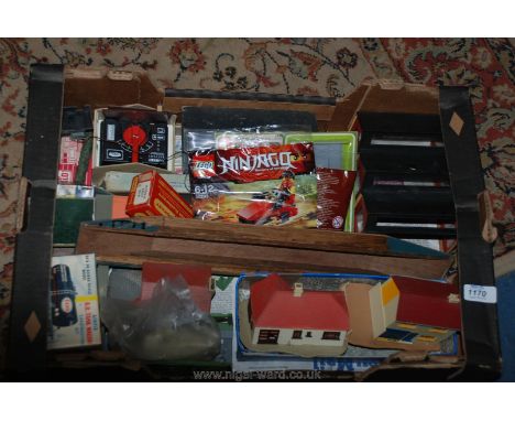 A box of model railway buildings, etc.