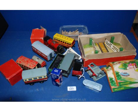 A box of toy Railway including '0' gauge and '00' gauge to include Hornby, Brimtoy, etc. (some boxed)