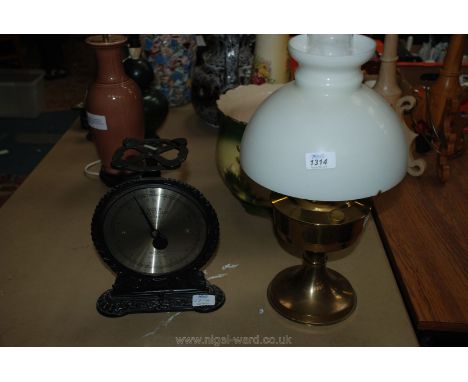 A brass lamp with white glass shade and a Salters Family Scales no.45, pan missing.
