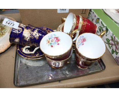 Six Crown Staffordshire gold and floral pattern coffee cups and saucers pattern no. R 15521 together with a pair of Crown Sta