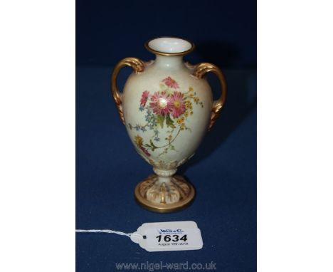 A compact Royal Worcester footed Vase having a narrow neck and gilded loop handles, decorated with trailing flower blooms inc