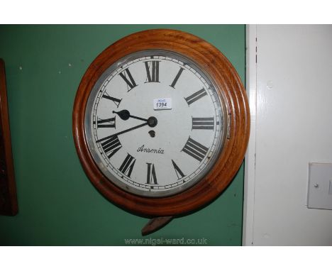 An Ansonia circular Wall Clock.