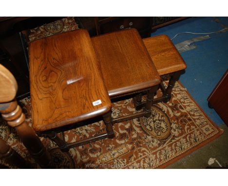 A nest of three Ercol style Occasional Tables