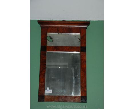 A Walnut framed rectangular Wall Mirror with two mirrors incorporated, the upper one having deterioration to the silvering, 1