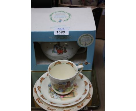A Royal Doulton Bunnykins trio and a Wedgwood Peter Rabbit tea for one teapot