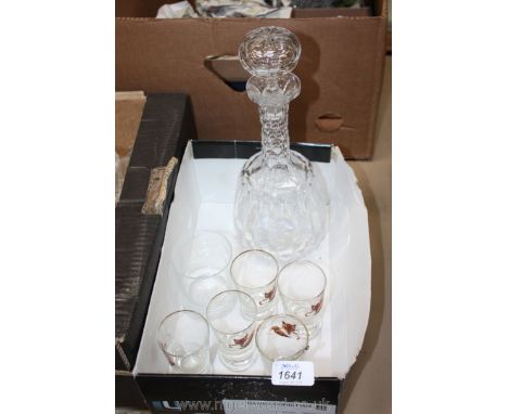 A cut glass Decanter, various shot glasses, etc.,
