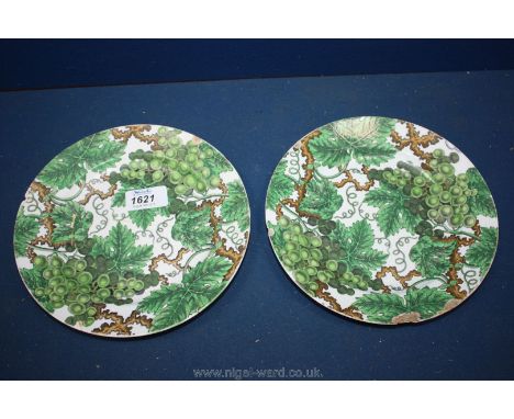 A pair of old Spode earthenware plates with green grapevine decoration marked 3058