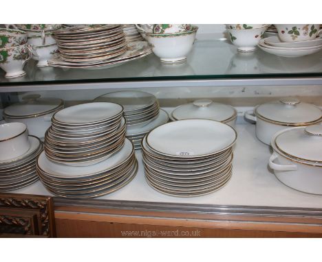 A Jonelle made in Germany white and gold Dinner Service including twelve dinner plates, twelve side plates, twelve bowls, twe