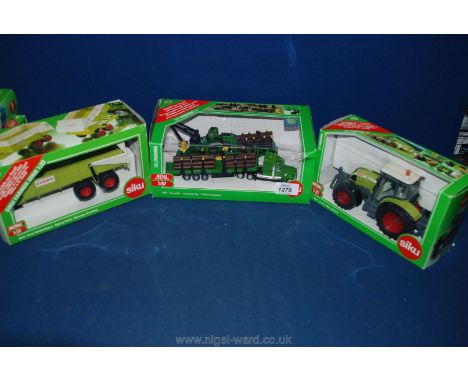 Three toys - 1:32 Siku Claas tipping trailer, Claas Ares 697 ATZ tractor and a 1:87 Forestry Set (all boxed)