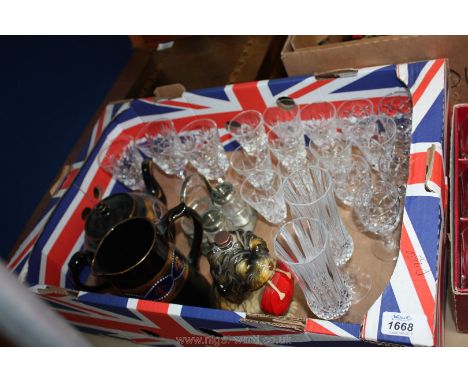 A quantity of glass and china including wine glasses, teapot and jug and dog shaped flask