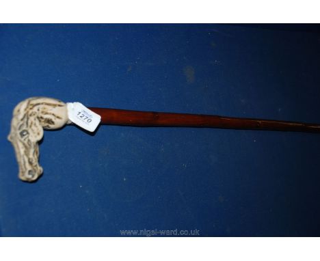 A Walking Stick with horse head handle