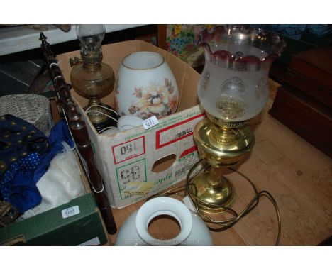 An Oil lamp and spare parts