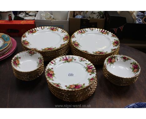 A Royal Worcester Old Country Roses part Dinner set including 19 dinner plates, 12 smaller plates, 6 large bowls and 9 smalle