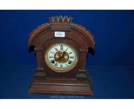 An oak cased Bracket Clock with two train movement by Ansonia Clock Co, USA