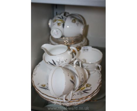 A Colclough 'Starburst' bone china Tea Service including seven cups and saucers, twelve side plates, three bread and butter p