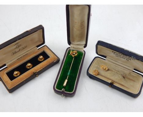 Three 9ct yellow gold dress studs, together with two 14ct yellow gold and pearl set pins and a Victorian 18ct yellow gold pin