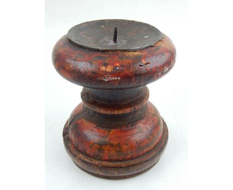 A 17th century style fruit wood and polychrome painted pricket candlestick. H. 14cm