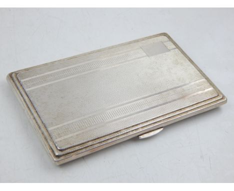 A silver rectangular cigarette case, Birmingham 1918, with stepped engine turned covers, 7.5oz.